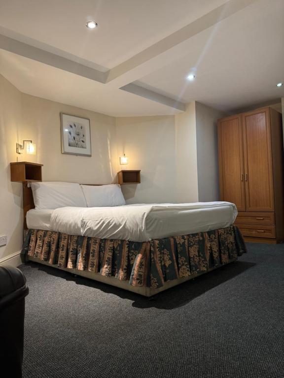 Letto o letti in una camera di Bridge Park Hotel