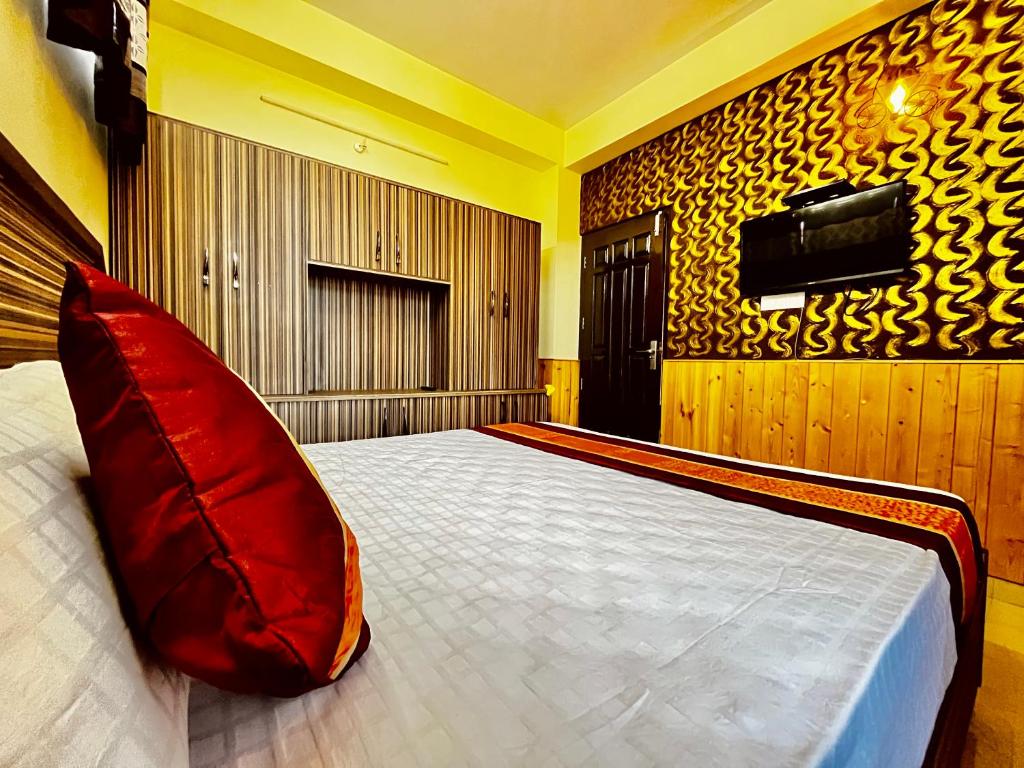 Postel nebo postele na pokoji v ubytování Puri's BnB