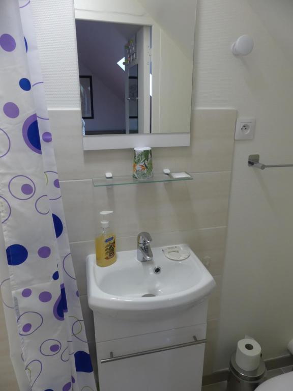 Kúpeľňa v ubytovaní Le clos fleuri - Chambres d'hôtes