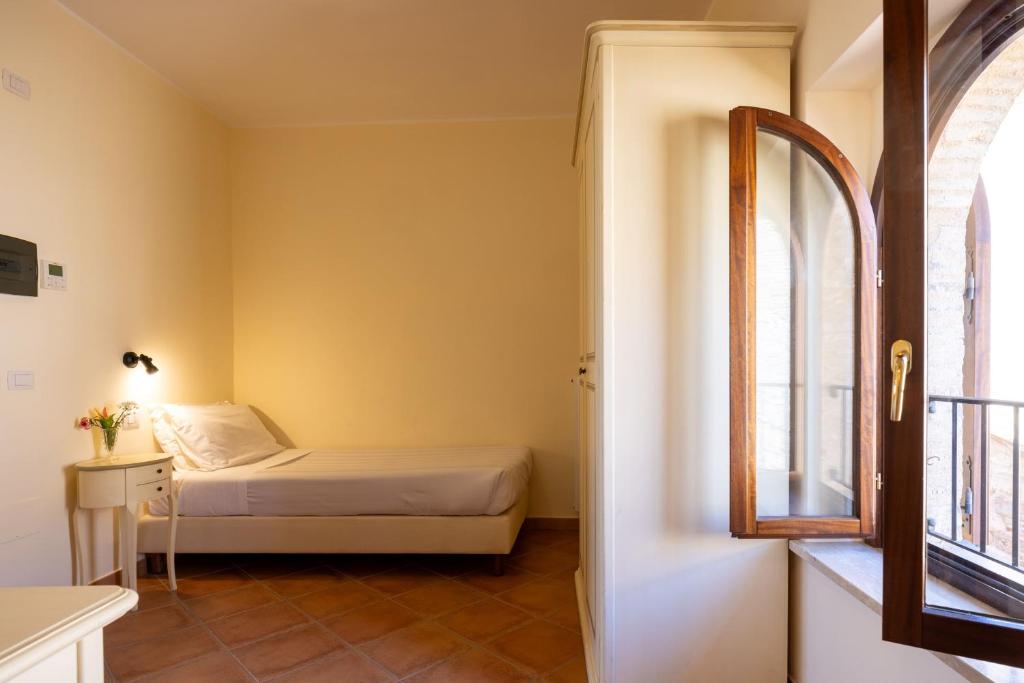 Postel nebo postele na pokoji v ubytování Hotel Monastero Sant'Andrea