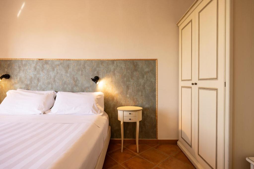 Postel nebo postele na pokoji v ubytování Hotel Monastero Sant'Andrea