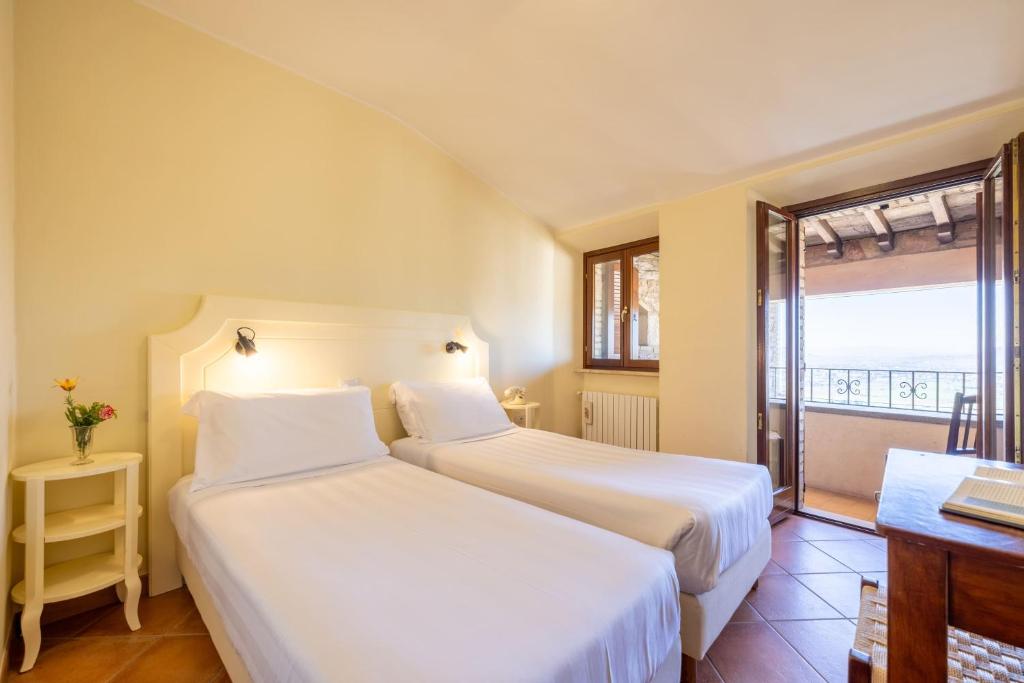 Postel nebo postele na pokoji v ubytování Hotel Monastero Sant'Andrea