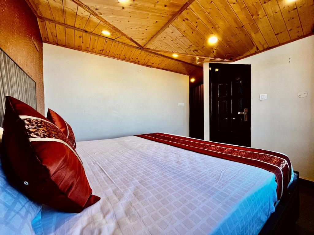 Postel nebo postele na pokoji v ubytování Puri's BnB