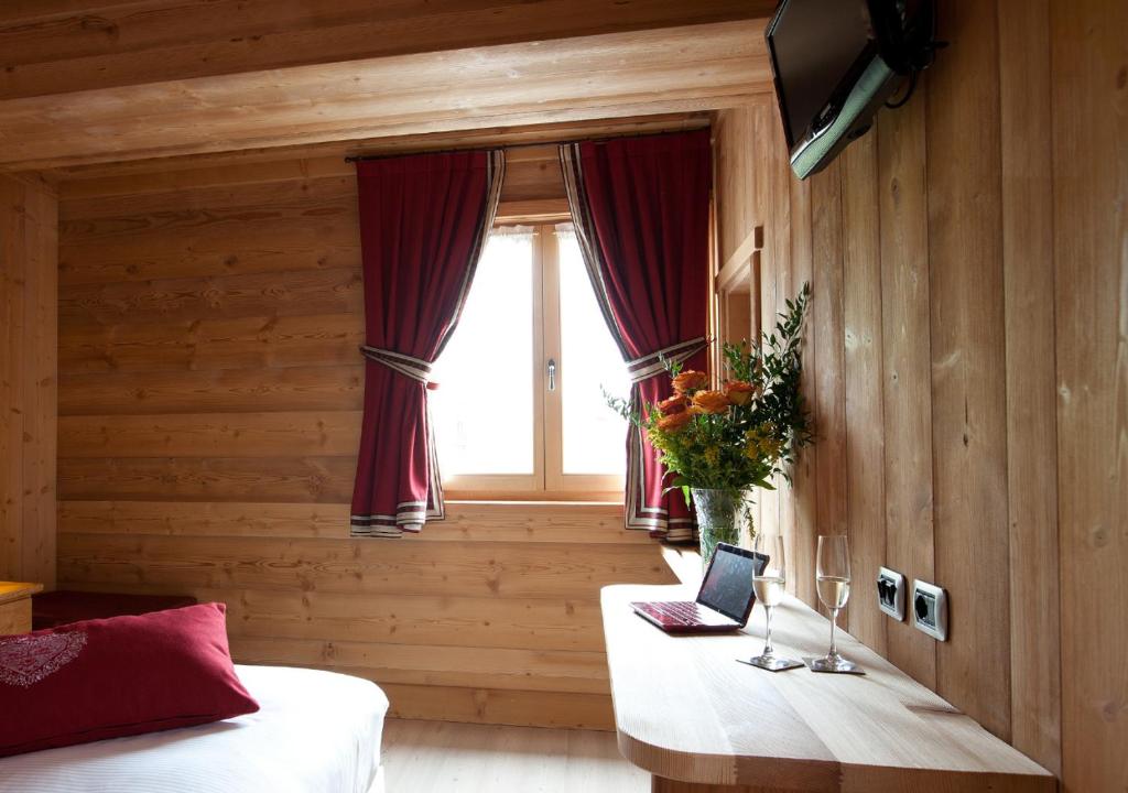 TV a/nebo společenská místnost v ubytování Hotel Funivia