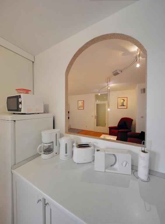 Kuchyň nebo kuchyňský kout v ubytování Apartman Osijek