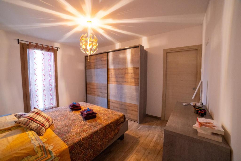 Katil atau katil-katil dalam bilik di Residence dei Fiori