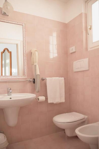 Koupelna v ubytování Hotel Oasi