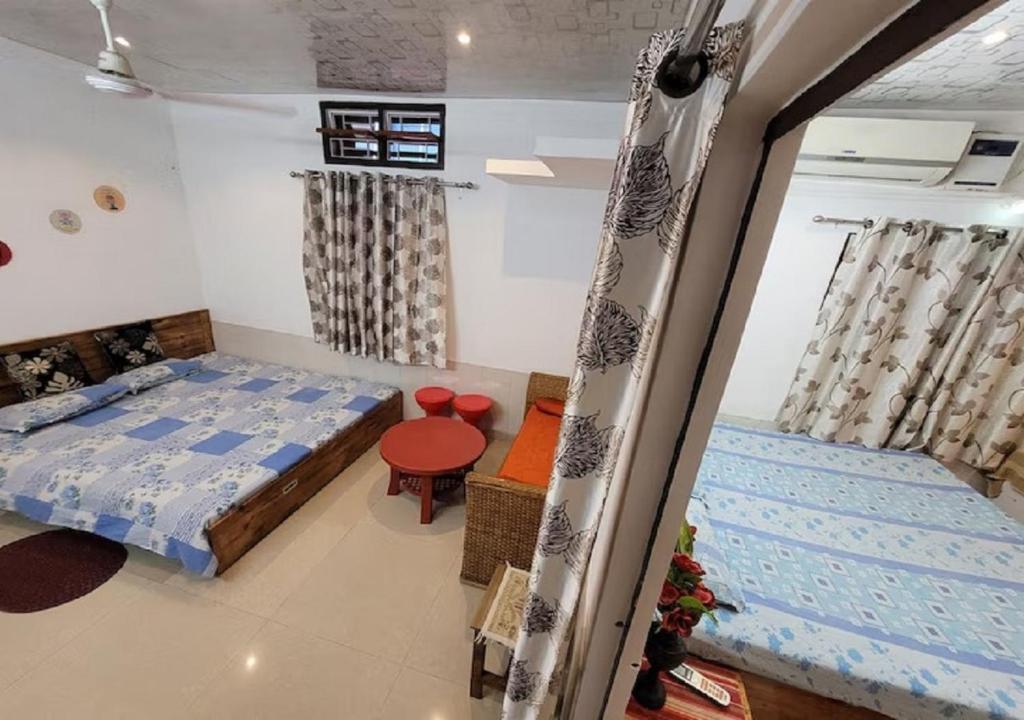 Postel nebo postele na pokoji v ubytování Amazing Homestay