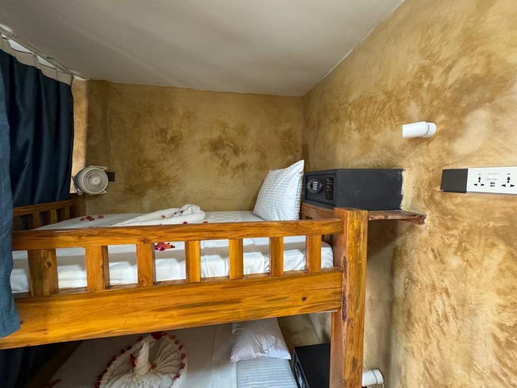 Postel nebo postele na pokoji v ubytování Compass Hostel