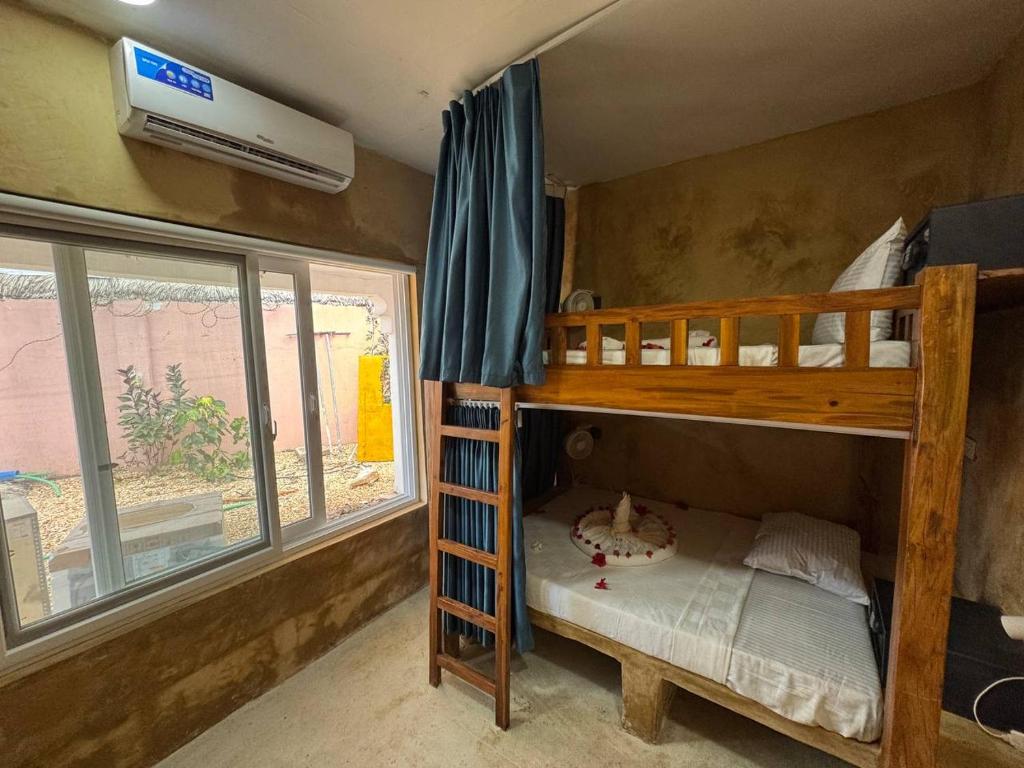 Postel nebo postele na pokoji v ubytování Compass Hostel