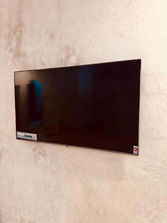 TV a/nebo společenská místnost v ubytování Compass Hostel