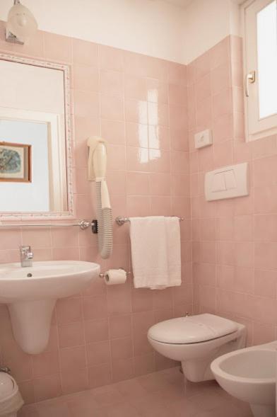 Koupelna v ubytování Hotel Oasi