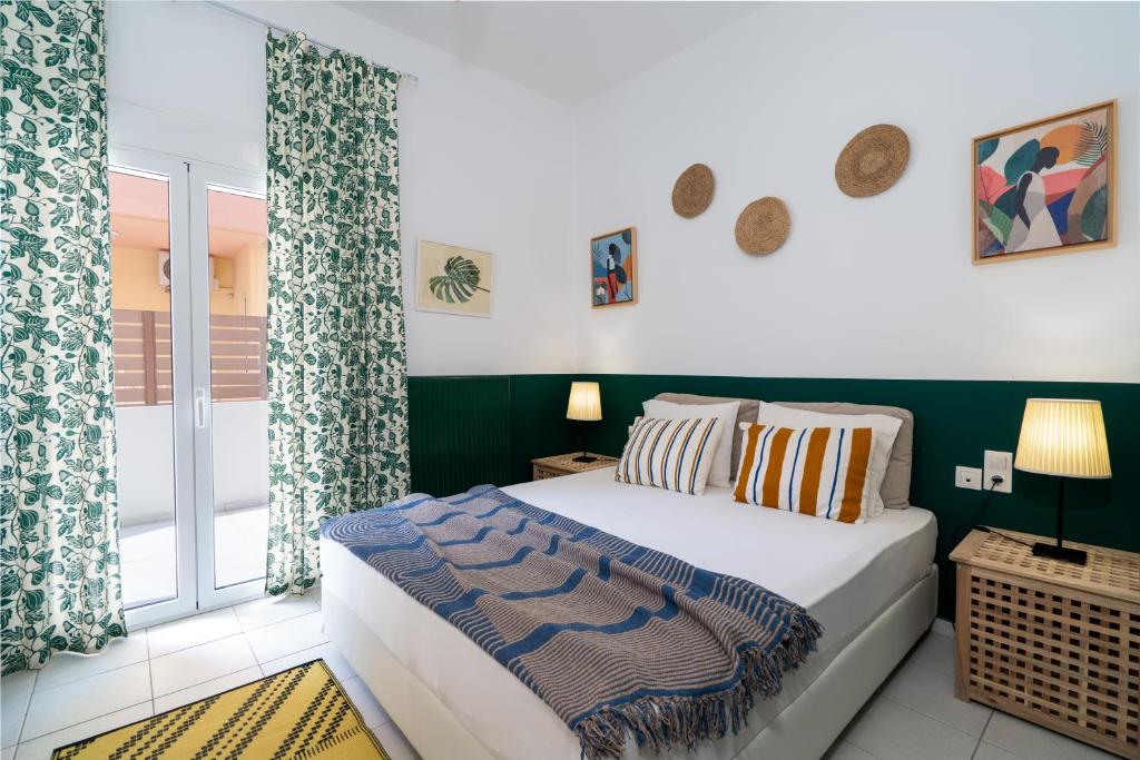 En eller flere senge i et værelse på Coastal Key 5