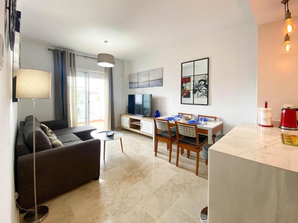 Televízia a/alebo spoločenská miestnosť v ubytovaní Pretty Place apartamento de vacaciones