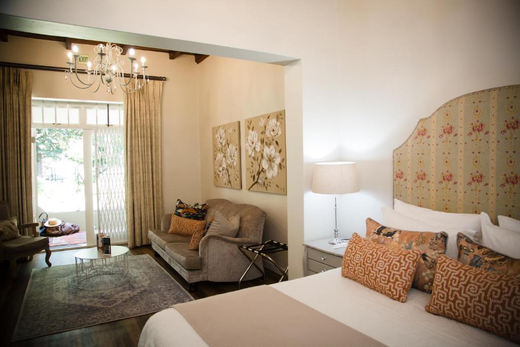 Ένα ή περισσότερα κρεβάτια σε δωμάτιο στο Afrika-Pearl