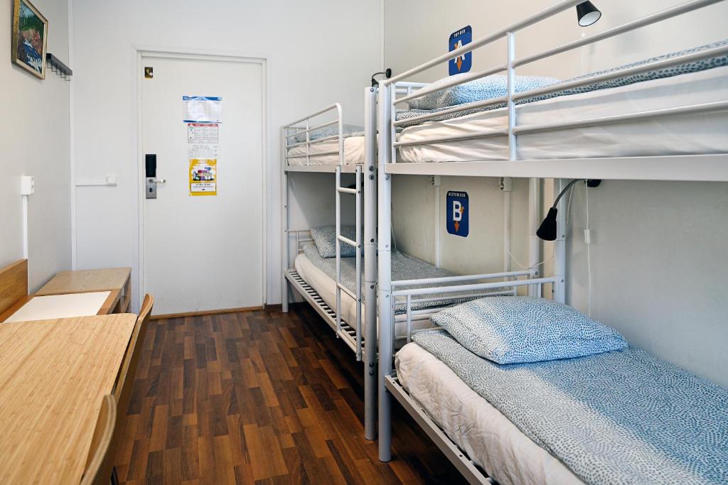 Postel nebo postele na pokoji v ubytování CheapSleep Hostel Helsinki
