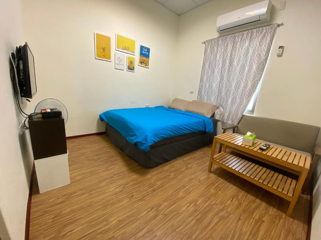 Postel nebo postele na pokoji v ubytování Chill島嶼