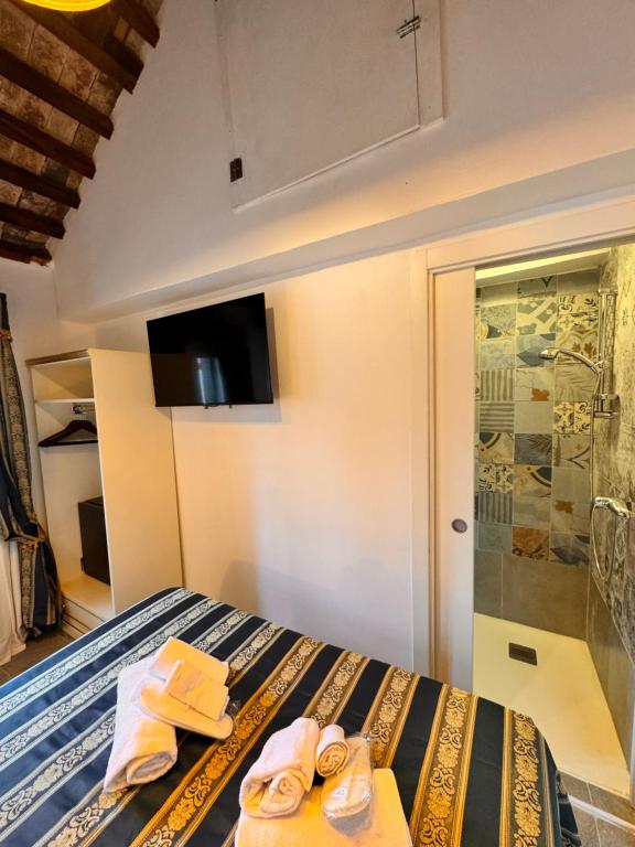 Postel nebo postele na pokoji v ubytování Piccolo Paradiso