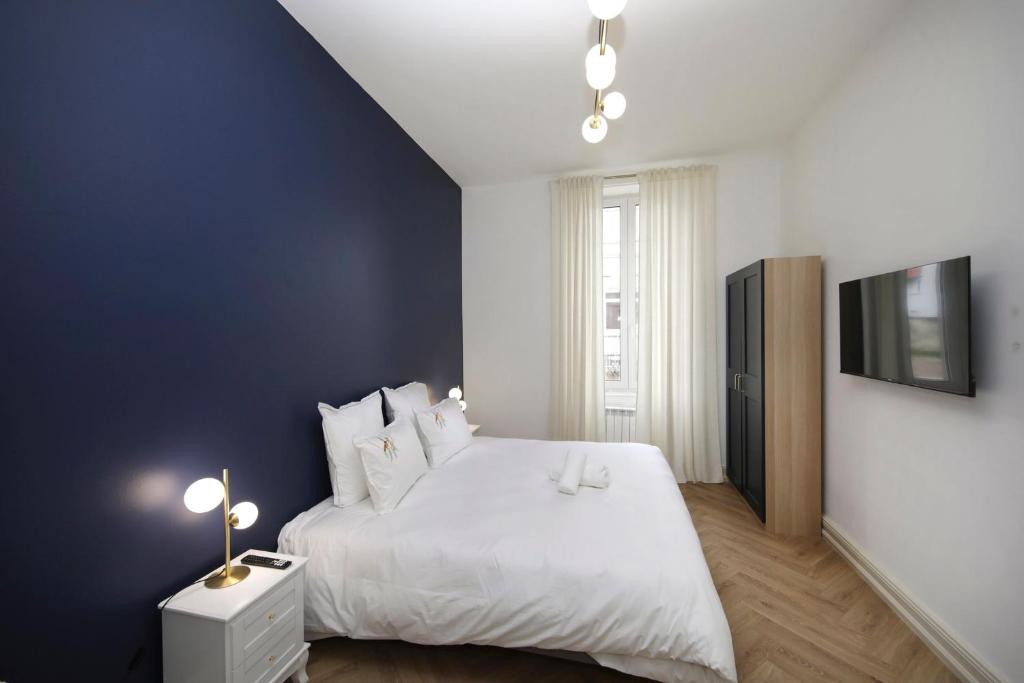 LE LYNX HAUSSMANIEN appartement tout confort, climatisé avec parking privé, à deux pas du centre – photo 33