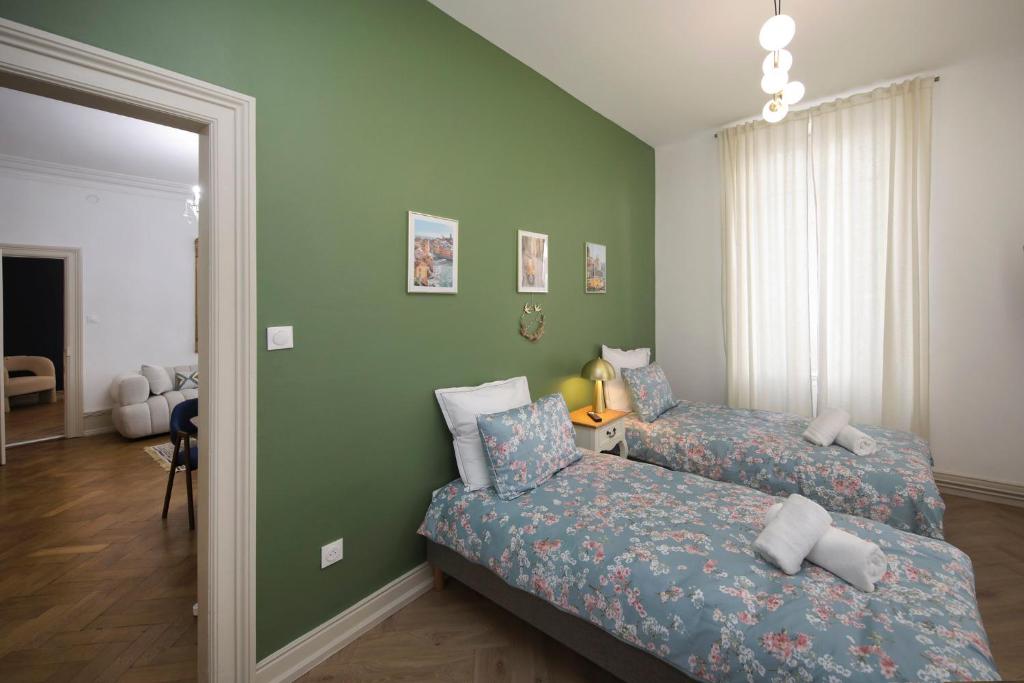 LE LYNX HAUSSMANIEN appartement tout confort, climatisé avec parking privé, à deux pas du centre – photo 34