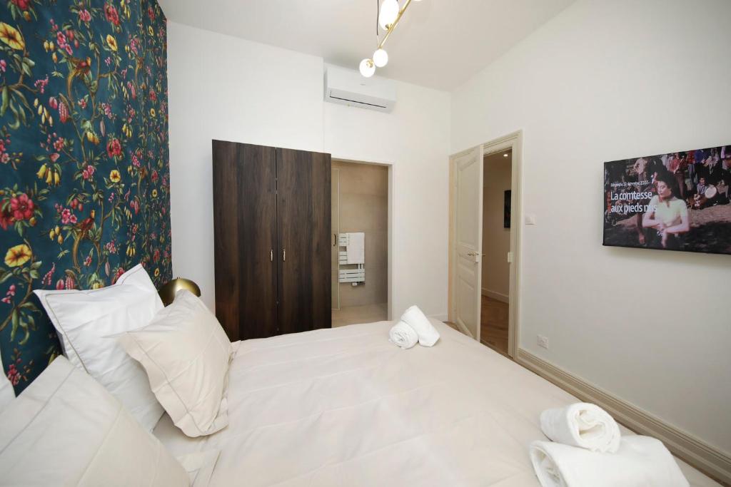 LE LYNX HAUSSMANIEN appartement tout confort, climatisé avec parking privé, à deux pas du centre – photo 22