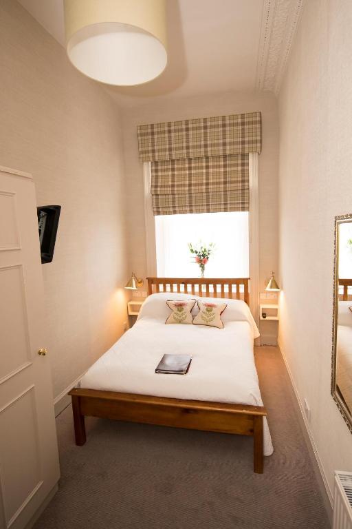Postel nebo postele na pokoji v ubytování Sherwood Guest House