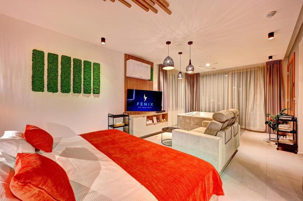 TV a/nebo společenská místnost v ubytování Wellness Hotel Fénix