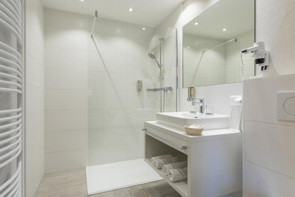 Koupelna v ubytování Hotel Burgstall