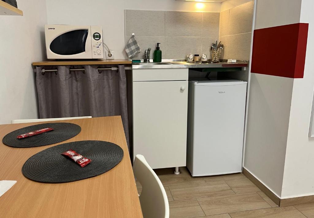Cucina o angolo cottura di 'MONAS' mini apartments