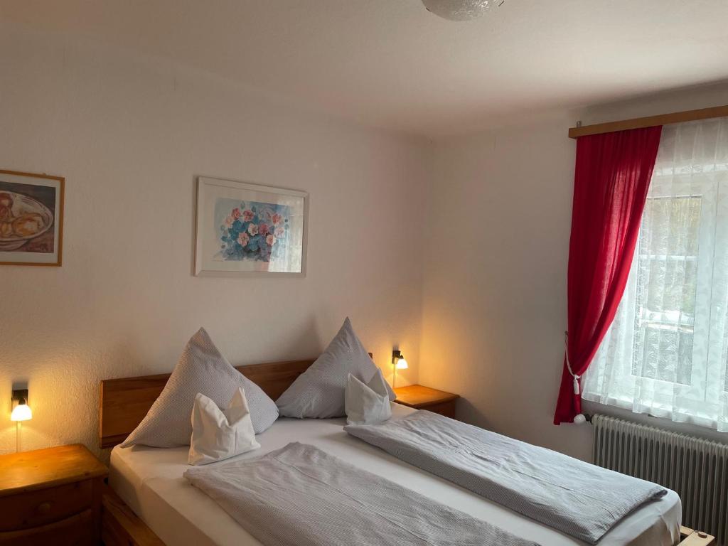 Postel nebo postele na pokoji v ubytování Gasthof Martinihof