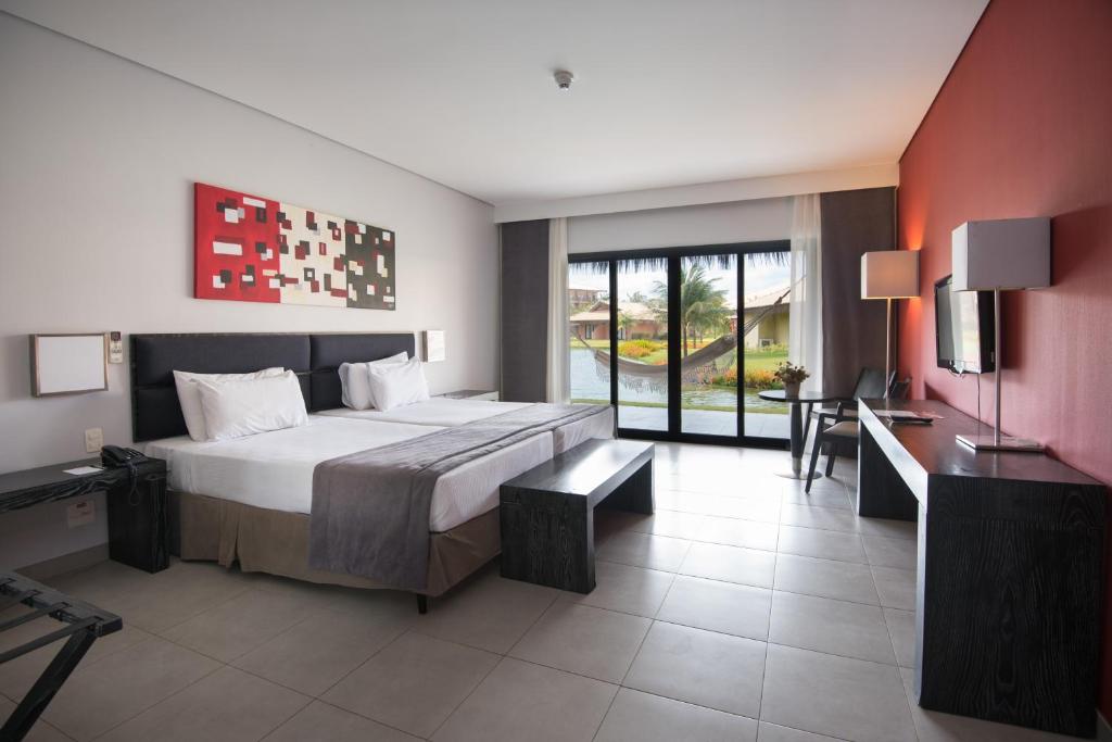 Postel nebo postele na pokoji v ubytování Vila Galé Resort Cumbuco - All inclusive