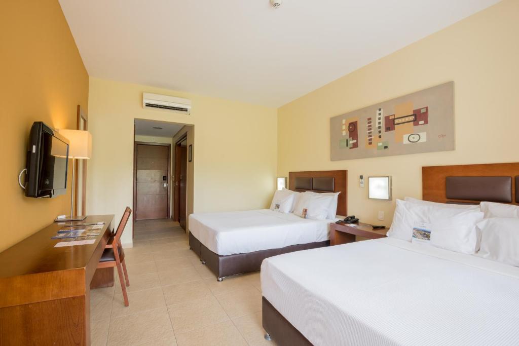 Postel nebo postele na pokoji v ubytování Vila Galé Resort Cumbuco - All inclusive