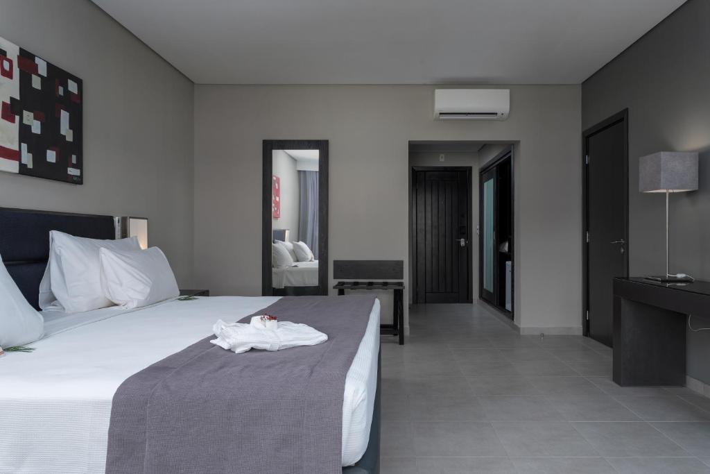 Postel nebo postele na pokoji v ubytování Vila Galé Resort Cumbuco - All inclusive