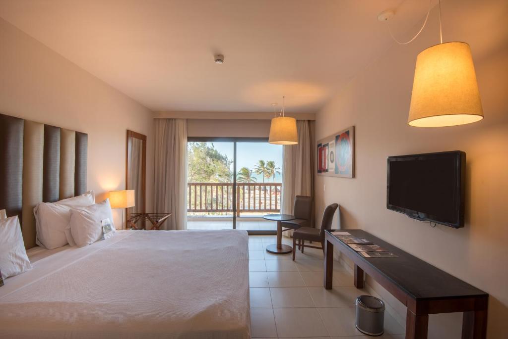 Postel nebo postele na pokoji v ubytování Vila Galé Resort Cumbuco - All inclusive