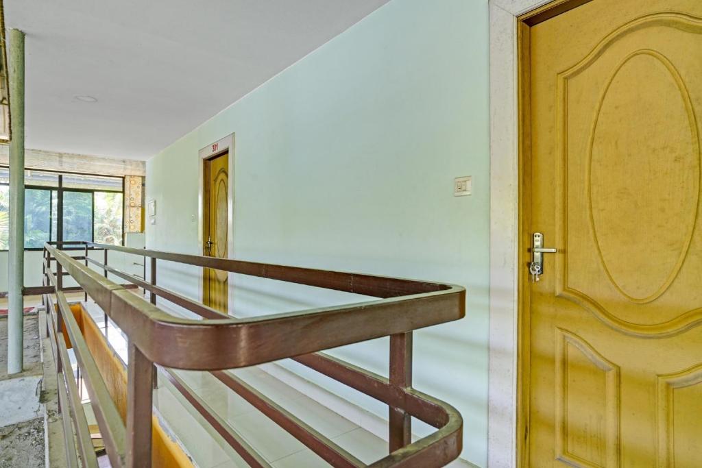 Postel nebo postele na pokoji v ubytování Hotel O SS Residency