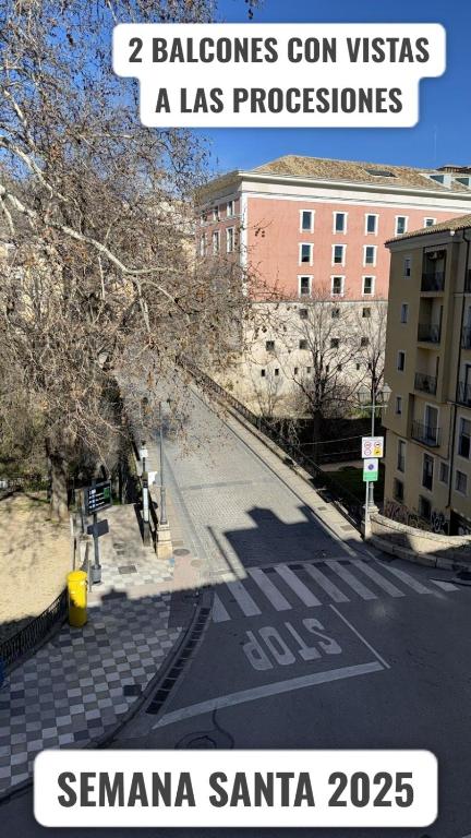 a picture of an empty street with a building at cuencaloft trinidad in Cuenca