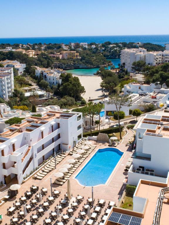 an aerial view of a resort with a swimming pool at MarSenses Ferrera Blanca Hotel Family in Cala d´Or