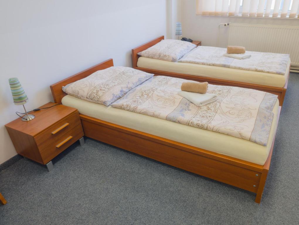 Postel nebo postele na pokoji v ubytování Pension Solnička