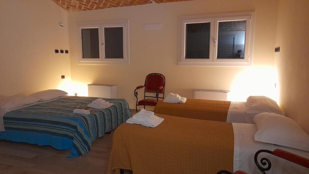 Postel nebo postele na pokoji v ubytování B&B Casa Pascolone