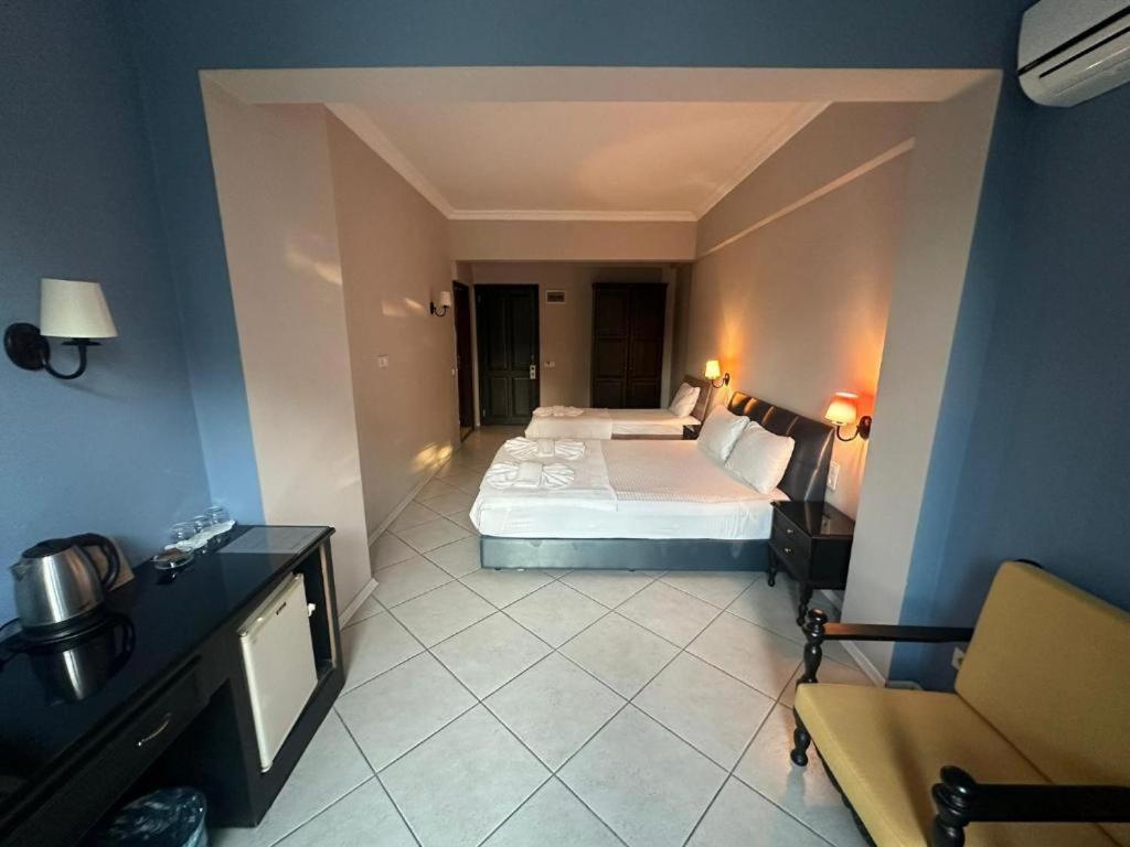 Postel nebo postele na pokoji v ubytování Akkent Garden Hotel