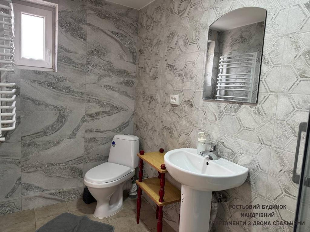 Koupelna v ubytování Guest House Mandrivnyi Rooms&Apartments
