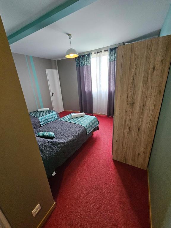 Postel nebo postele na pokoji v ubytování Les chambres du grès