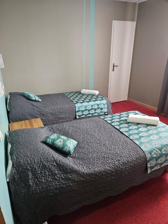 Postel nebo postele na pokoji v ubytování Les chambres du grès