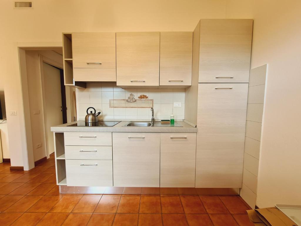 Kuchyňa alebo kuchynka v ubytovaní Caletta Apartments