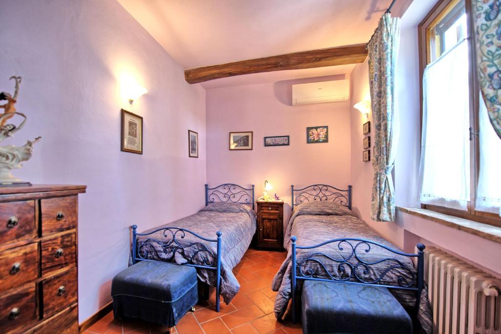 Posteľ alebo postele v izbe v ubytovaní Villa Sabrina by PosarelliVillas