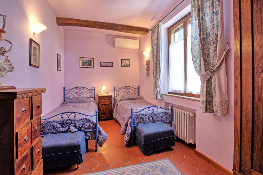 Posteľ alebo postele v izbe v ubytovaní Villa Sabrina by PosarelliVillas