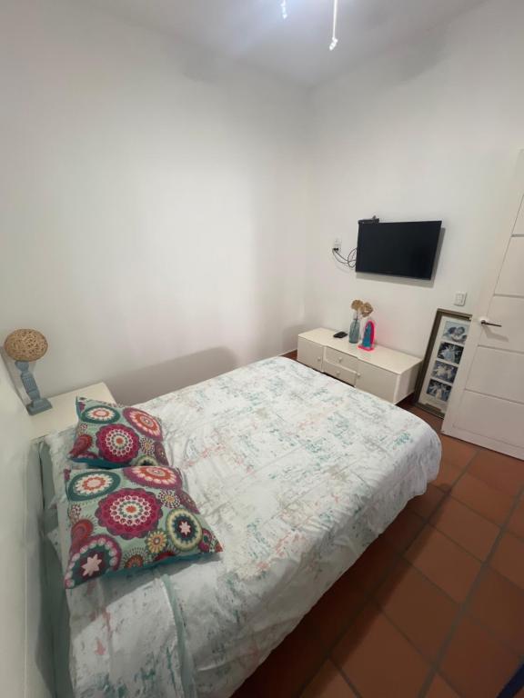 Postel nebo postele na pokoji v ubytování Hotel Casa Cuenca