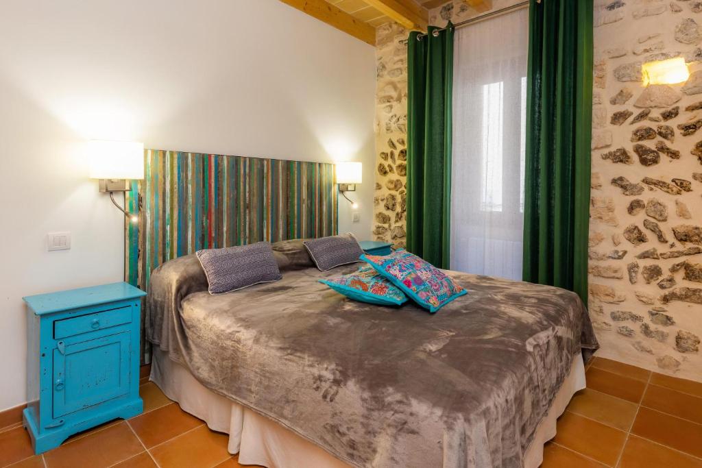 Postel nebo postele na pokoji v ubytování Casa Abeurador