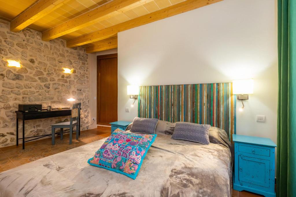 Postel nebo postele na pokoji v ubytování Casa Abeurador