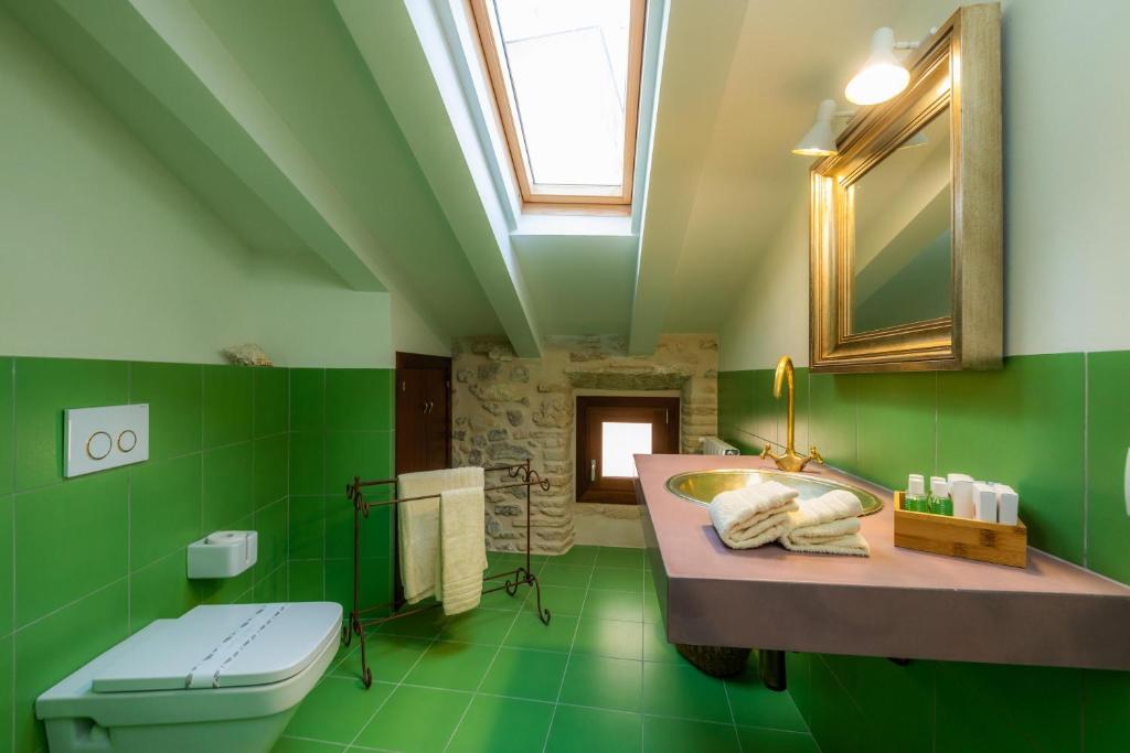 Koupelna v ubytování Casa Abeurador